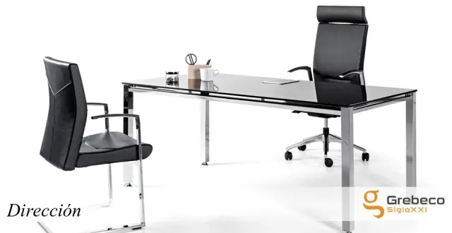 Imagen Mesa direccin estructura cromada tapa vidrio negro.